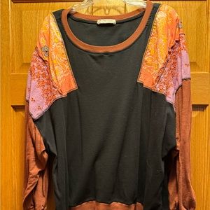 Free People size large great condition.  Dolman sleeves great detail.